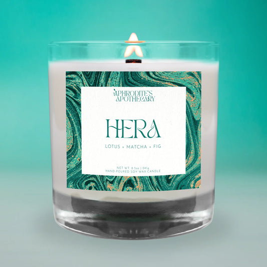 Hera Candle on a teal background