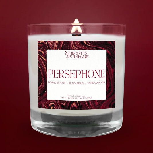 Persephone Candle on a scarlet background